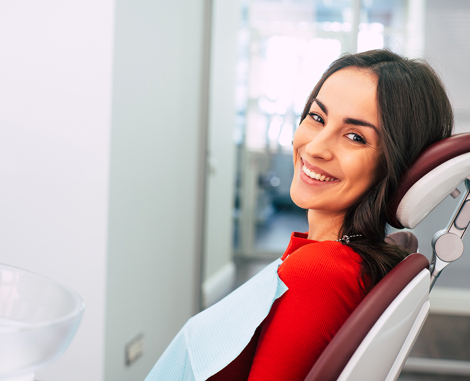 Smiling woman in dental chair